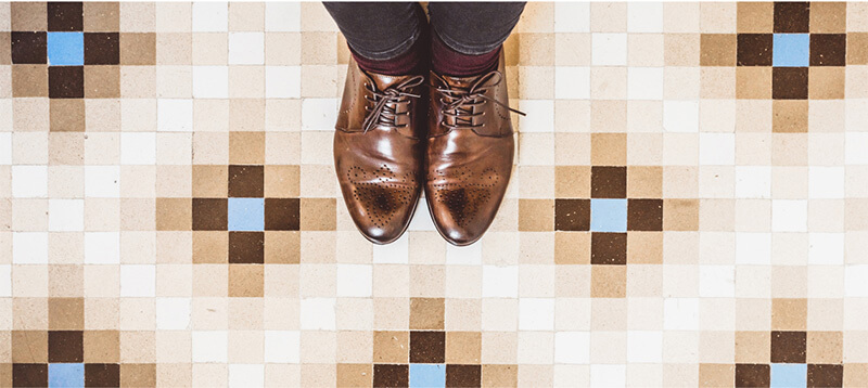 shoes on patterned tile 