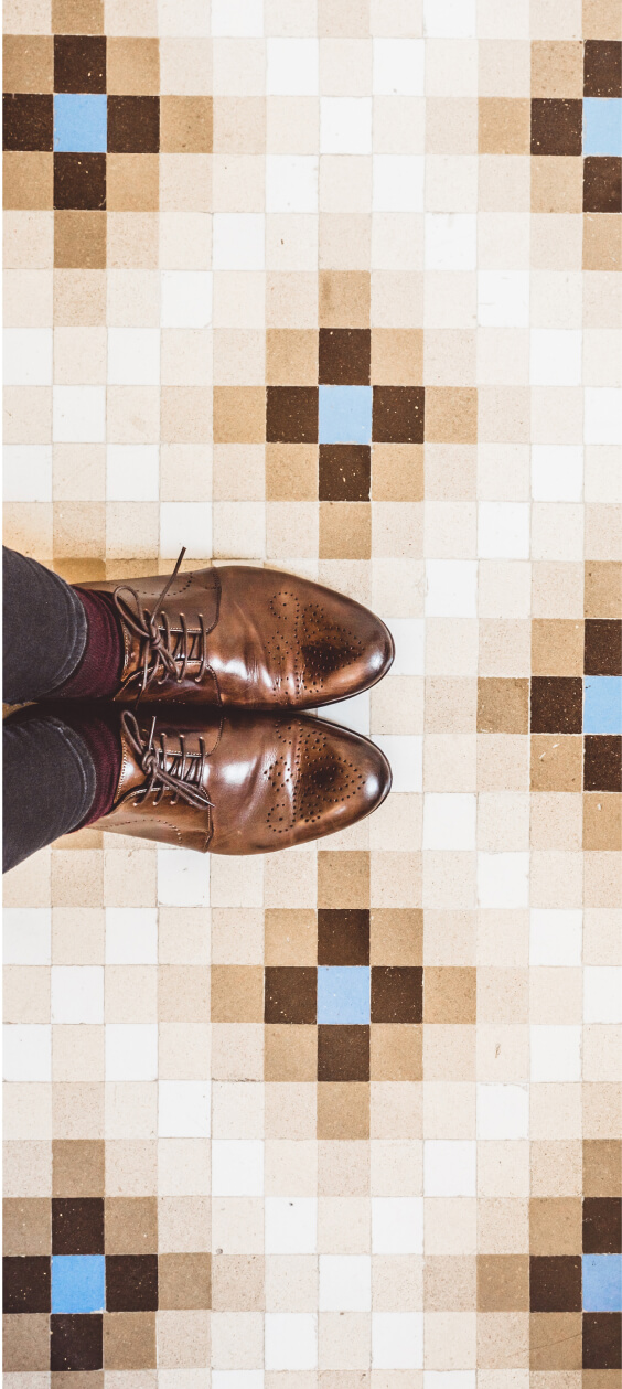 shoes on patterned tile 